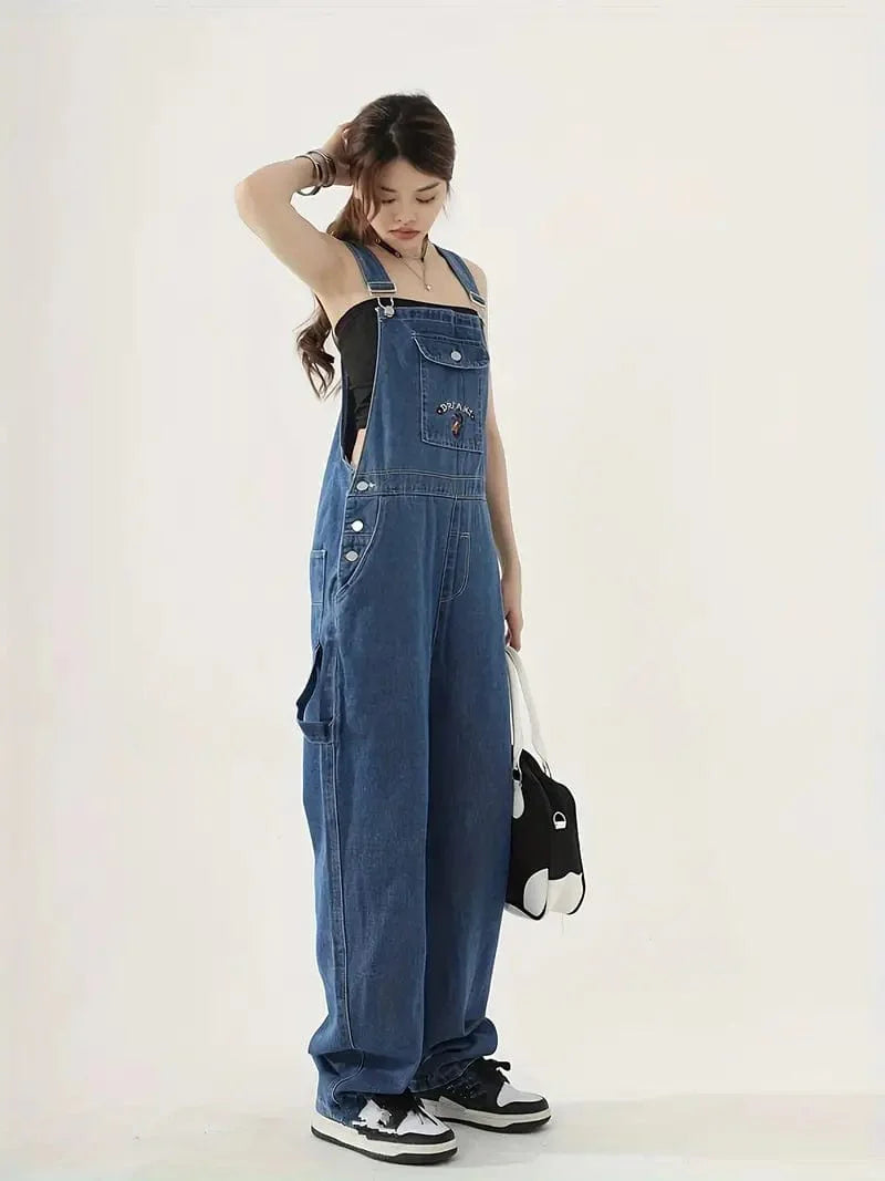 Relaxed Fit Blue Denim Romper with Slant Pockets, Distressed Denim Coverall, Stylish Women's Denim Outfit