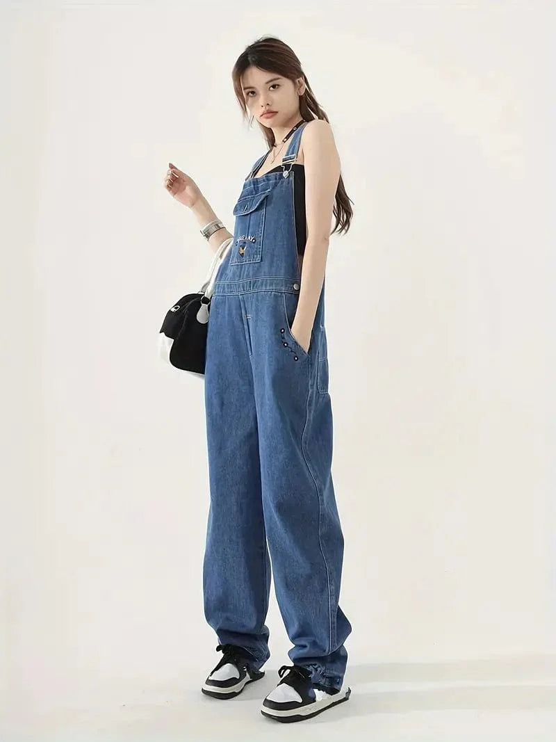 Relaxed Fit Blue Denim Romper with Slant Pockets, Distressed Denim Coverall, Stylish Women's Denim Outfit