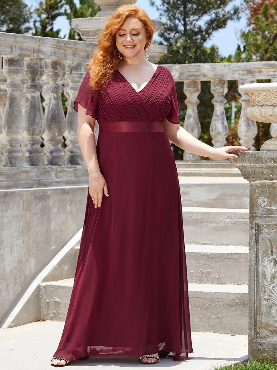 Ruffled Empire Waist Plus Size Evening Gown with V-Neck and Flutter Sleeves