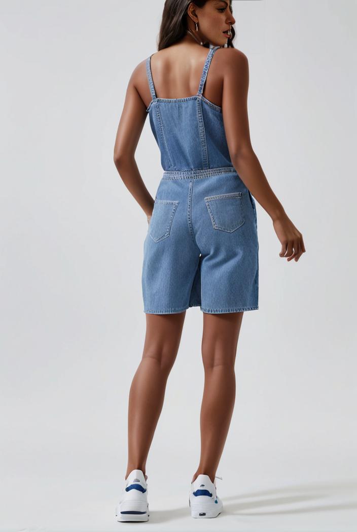 blue denim jumpsuit with distressed ripped details for women 129259