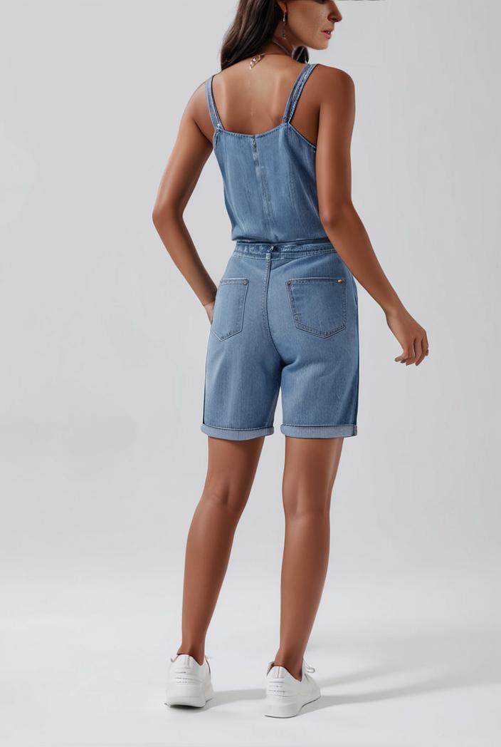 blue denim jumpsuit with distressed ripped details for women 139120
