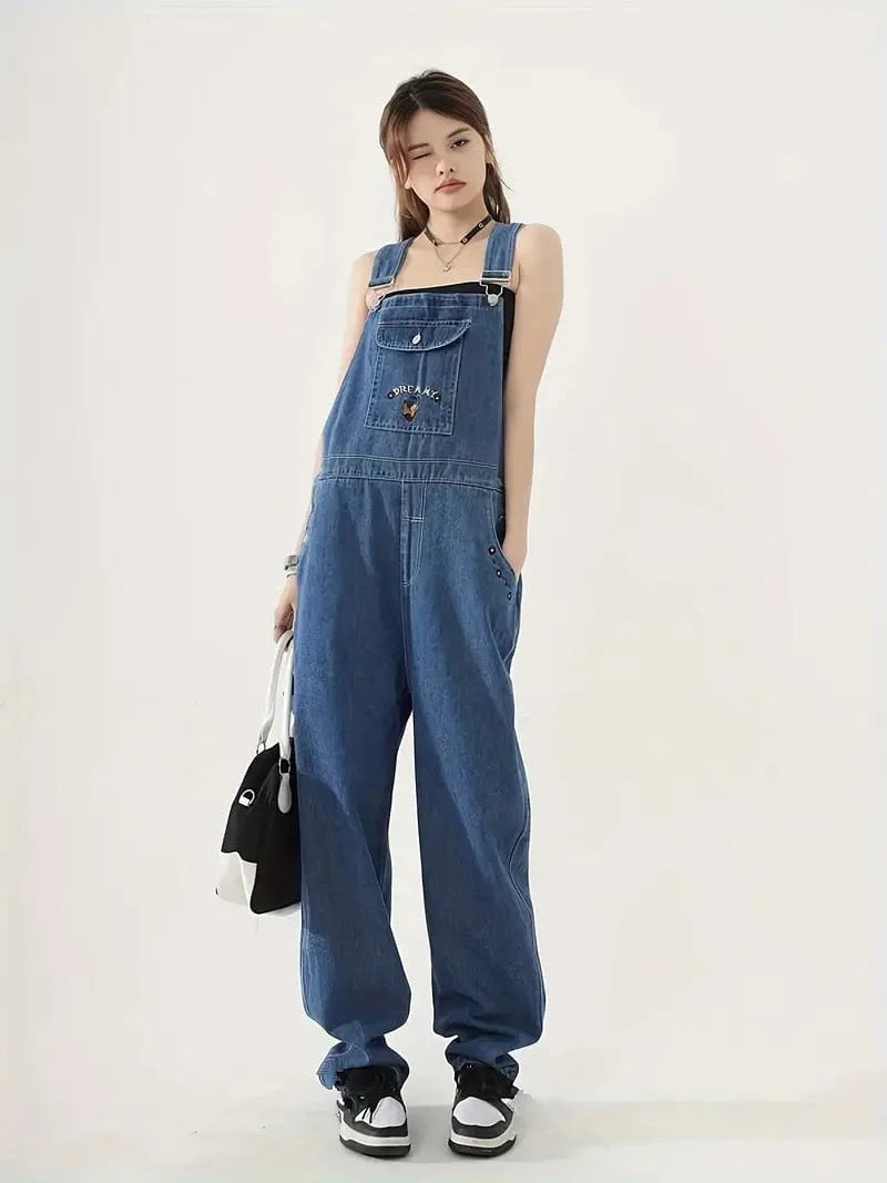 Relaxed Fit Blue Denim Romper with Slant Pockets, Distressed Denim Coverall, Stylish Women's Denim Outfit