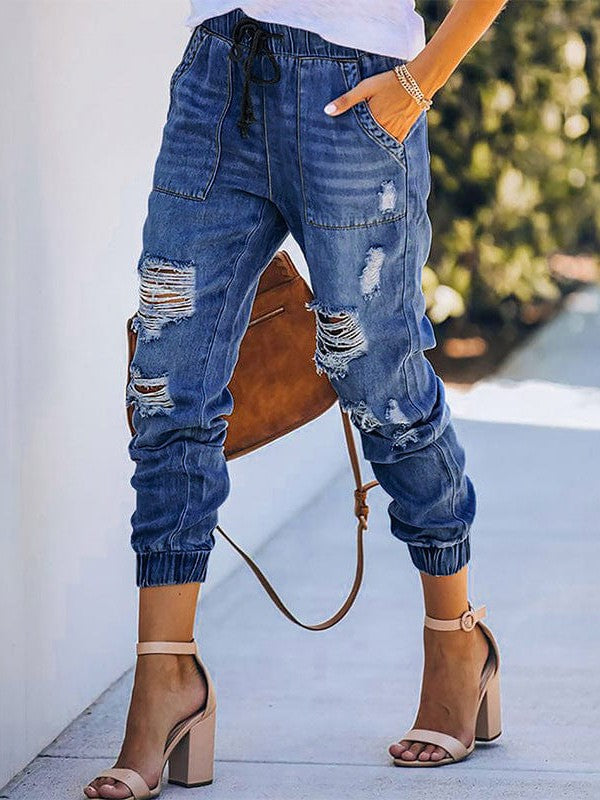 Fashionable and Stylish Denim Harem Jeans with Ripped Legs for Women