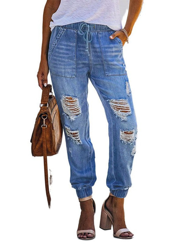 Fashionable and Stylish Denim Harem Jeans with Ripped Legs for Women