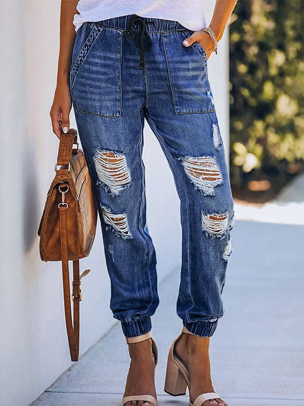 Fashionable and Stylish Denim Harem Jeans with Ripped Legs for Women