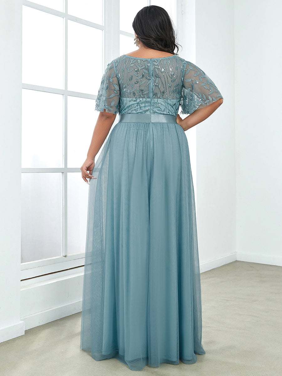 Shimmering Evening Gown with Ruffle Sleeves and Belt Detail