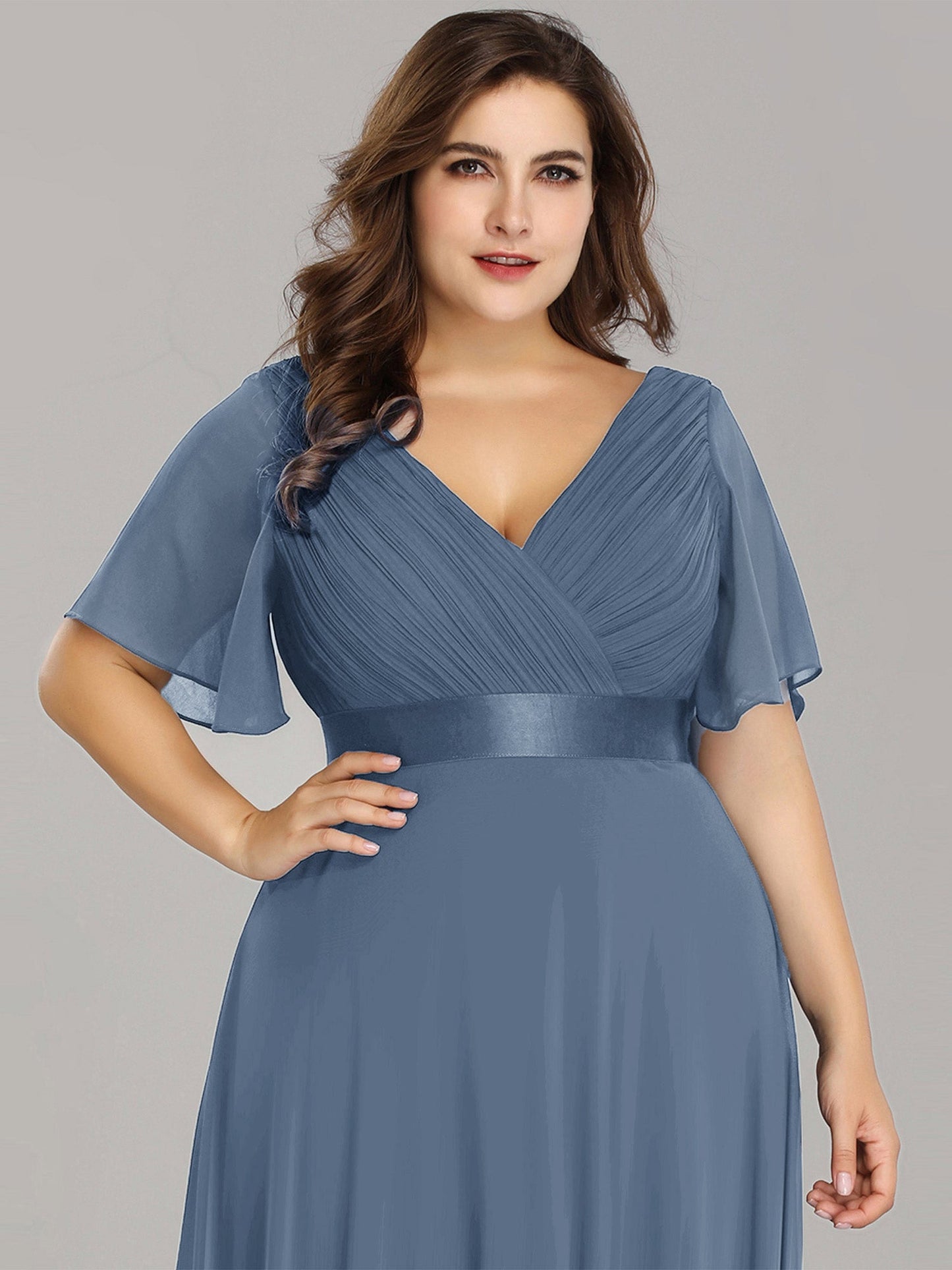 Ruffled Empire Waist Plus Size Evening Gown with V-Neck and Flutter Sleeves